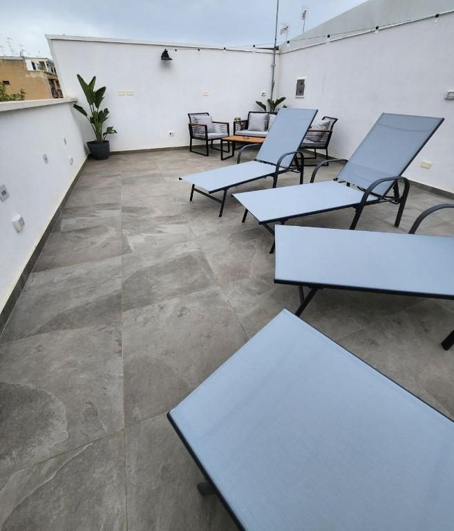 Lettini prendisole in terrazza