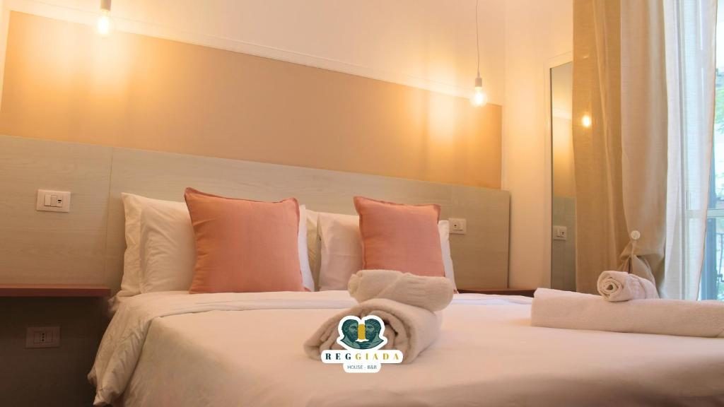 Camera Matrimoniale con Balcone: letto con luci soffuse - Reggiada House B&B Reggio Calabria